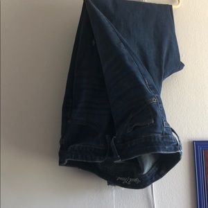 Universals thread dark wash jeans